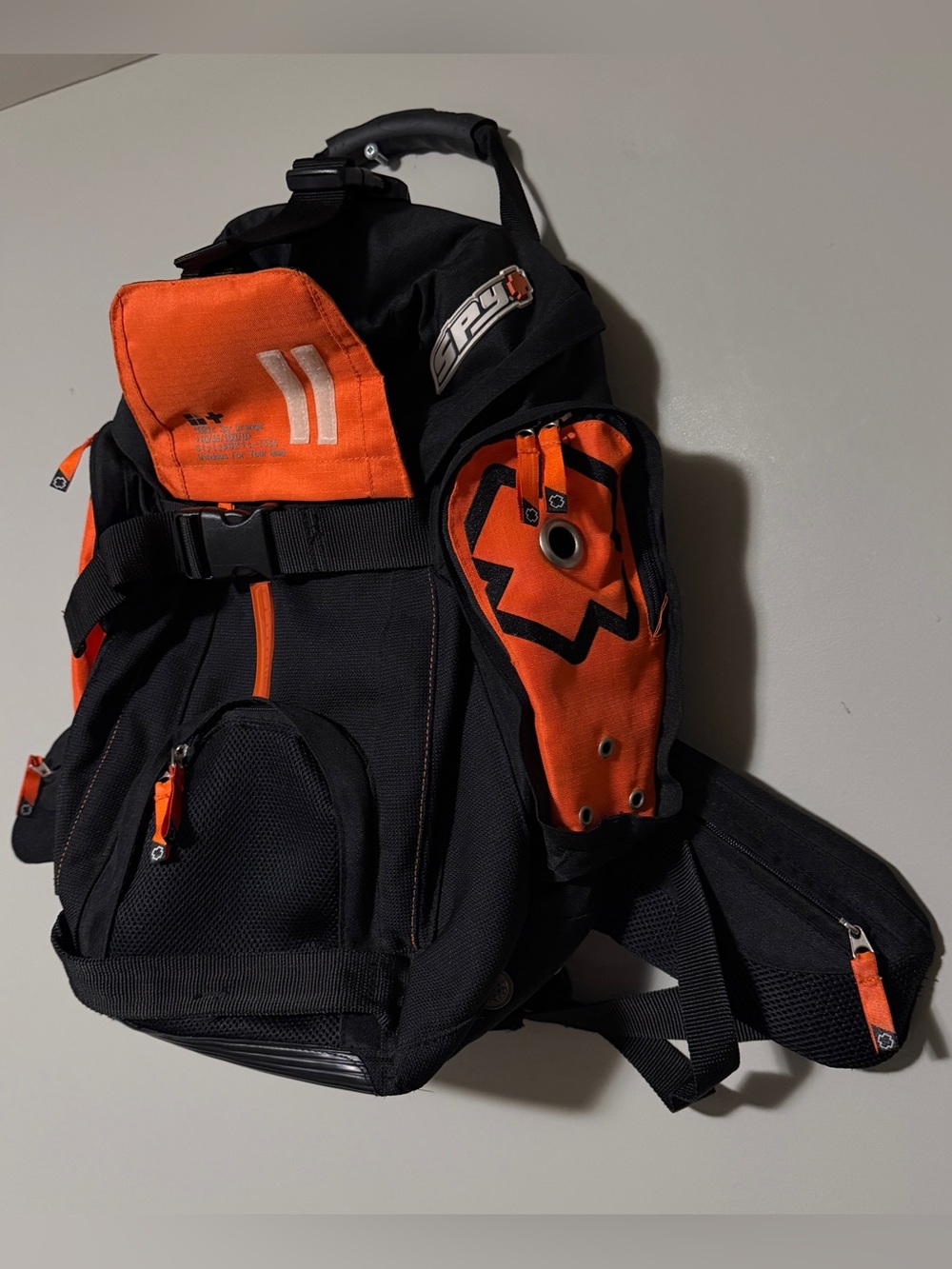 Y2K Spy snowboard / skateboard orange/black backpack with water bottle holder